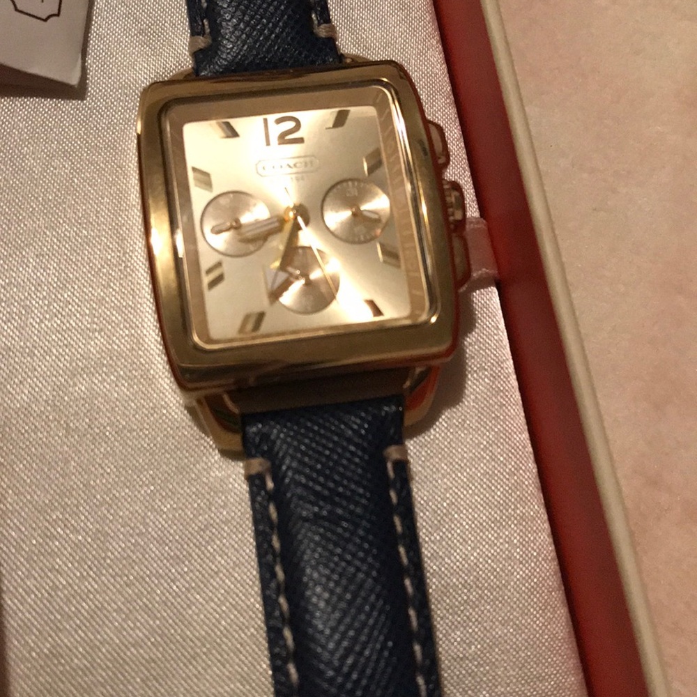 Blue and gold Coach watch.